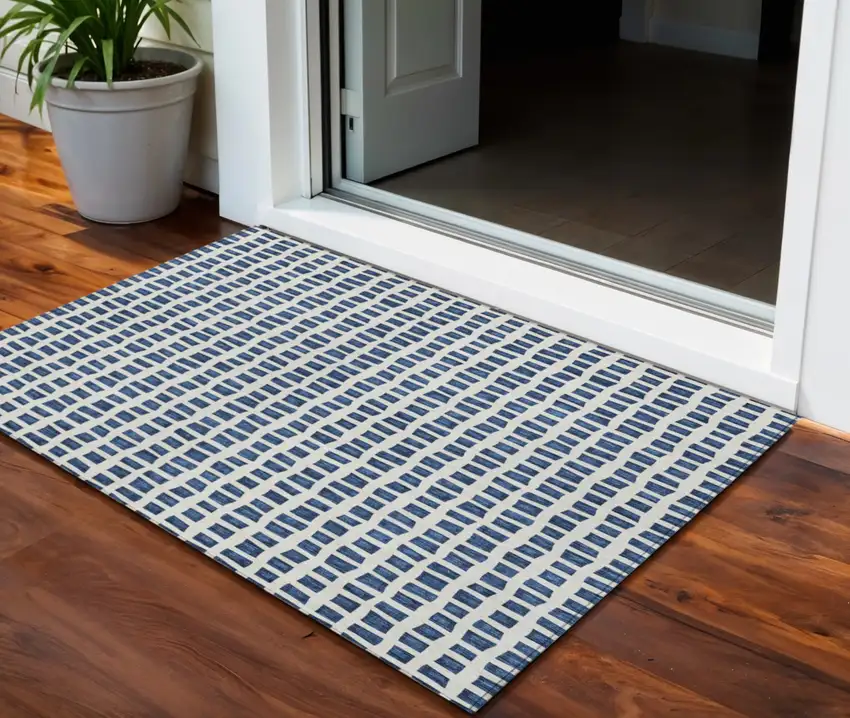 Navy Blue And Ivory Geometric Washable Indoor Outdoor Area Rug Photo 1