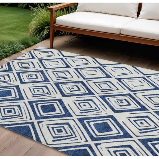Navy Blue And Ivory Geometric Washable Indoor Outdoor Area Rug Photo 1