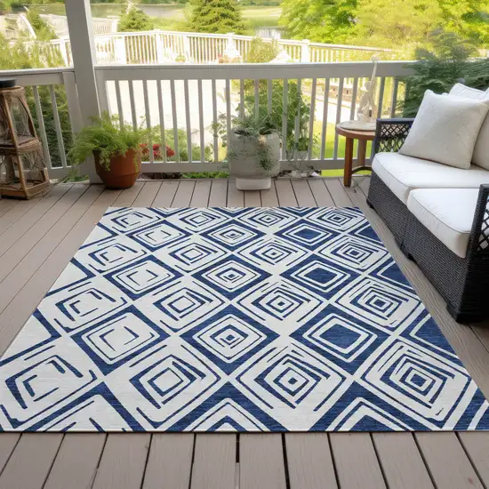 Navy Blue And Ivory Geometric Washable Indoor Outdoor Area Rug Photo 6
