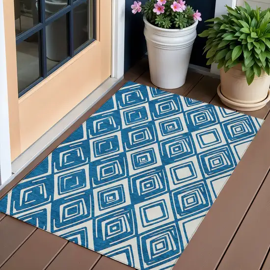 Navy Blue And Ivory Geometric Washable Indoor Outdoor Area Rug Photo 1