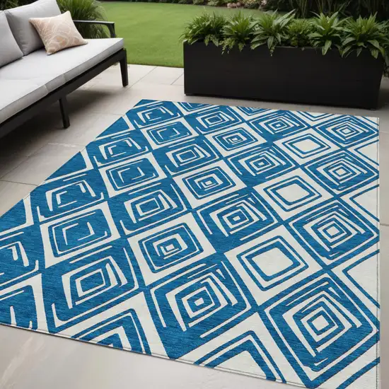 Navy Blue And Ivory Geometric Washable Indoor Outdoor Area Rug Photo 1
