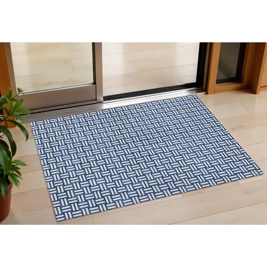 Navy Blue And Ivory Geometric Washable Indoor Outdoor Area Rug Photo 1