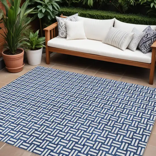 Navy Blue And Ivory Geometric Washable Indoor Outdoor Area Rug Photo 1