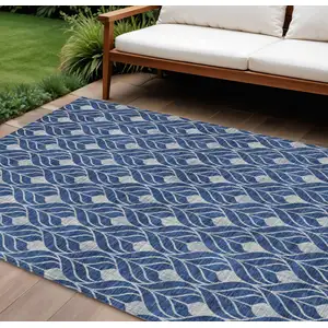 Photo of Navy Blue And Ivory Geometric Washable Indoor Outdoor Area Rug