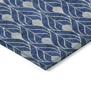 Photo of Navy Blue And Ivory Geometric Washable Indoor Outdoor Area Rug
