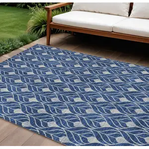 Photo of Navy Blue And Ivory Geometric Washable Indoor Outdoor Area Rug