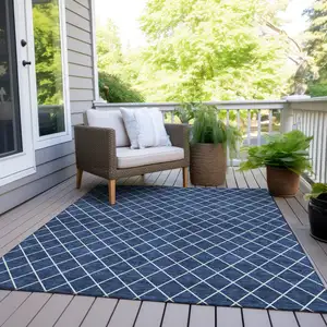 Photo of Navy Blue And Ivory Geometric Washable Indoor Outdoor Area Rug