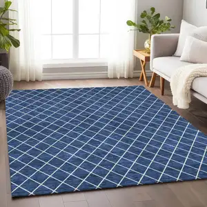 Photo of Navy Blue And Ivory Geometric Washable Indoor Outdoor Area Rug