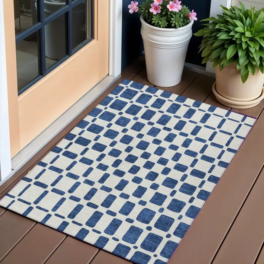 Navy Blue And Ivory Geometric Washable Indoor Outdoor Area Rug Photo 1