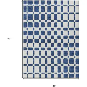 Photo of Navy Blue And Ivory Geometric Washable Indoor Outdoor Area Rug
