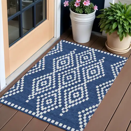 Navy Blue And Ivory Geometric Washable Indoor Outdoor Area Rug Photo 1