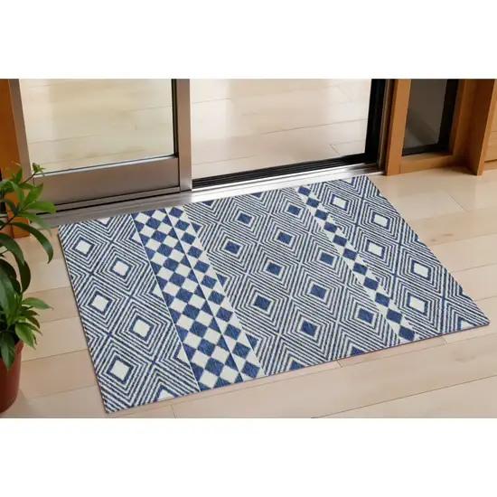 Navy Blue And Ivory Geometric Washable Indoor Outdoor Area Rug Photo 1