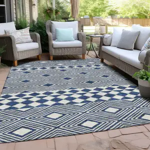 Photo of Navy Blue And Ivory Geometric Washable Indoor Outdoor Area Rug