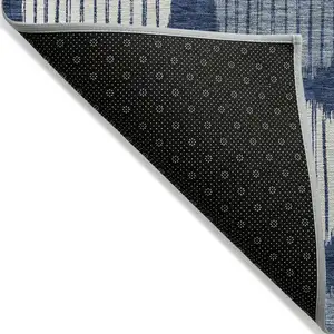 Photo of Navy Blue And Ivory Geometric Washable Indoor Outdoor Area Rug
