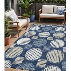 Photo of Navy Blue And Ivory Geometric Washable Indoor Outdoor Area Rug