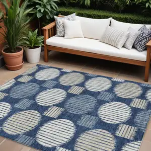 Photo of Navy Blue And Ivory Geometric Washable Indoor Outdoor Area Rug
