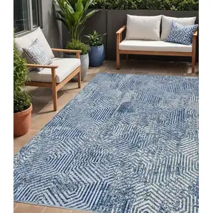 Photo of Navy Blue And Ivory Geometric Washable Indoor Outdoor Area Rug
