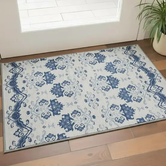 Navy Blue And Ivory Medallion Washable Area Rug With UV Protection Photo 2