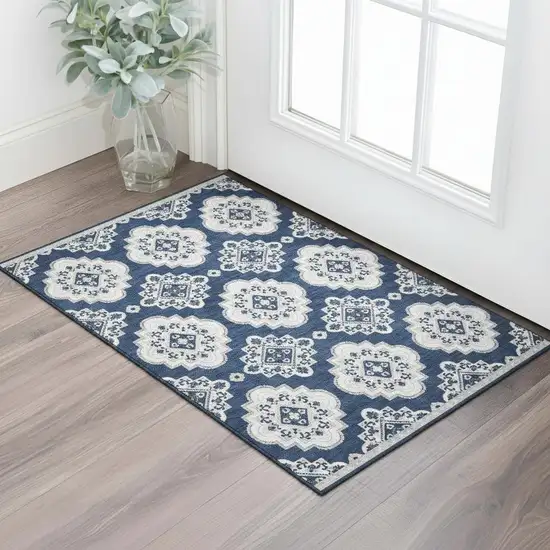 Navy Blue And Ivory Medallion Washable Area Rug With UV Protection Photo 1