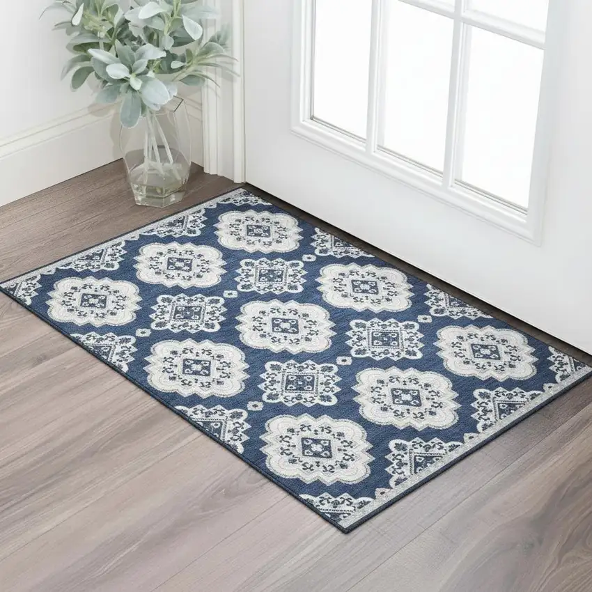 Navy Blue And Ivory Medallion Washable Area Rug With UV Protection Photo 1