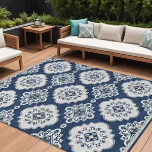 Photo of Navy Blue And Ivory Medallion Washable Indoor Outdoor Area Rug