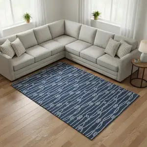 Photo of Navy Blue And Ivory Nautical Washable Area Rug With UV Protection
