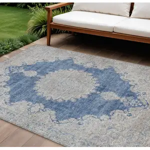 Photo of Navy Blue And Ivory Oriental Washable Indoor Outdoor Area Rug