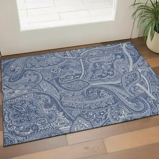 Navy Blue And Ivory Paisley Washable Area Rug With UV Protection Photo 1