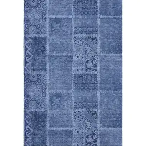 Photo of Navy Blue And Ivory Patchwork Washable Area Rug With UV Protection