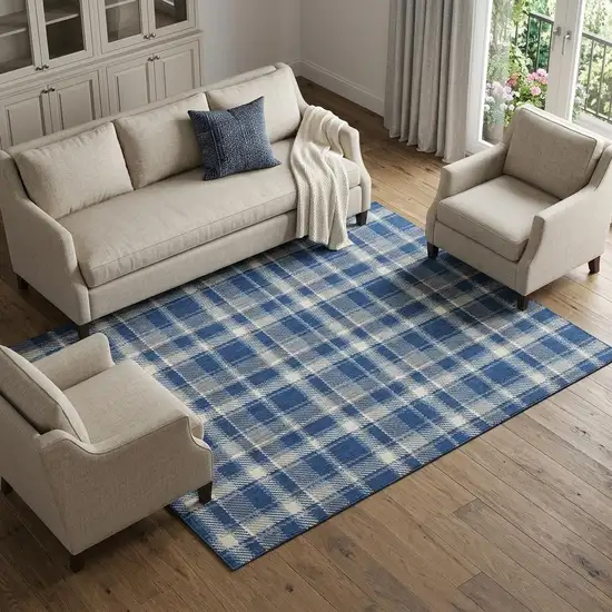 Navy Blue And Ivory Plaid Washable Area Rug With UV Protection Photo 1