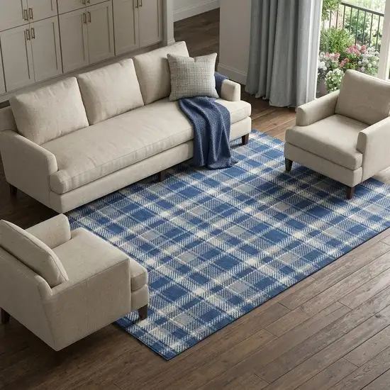 Navy Blue And Ivory Plaid Washable Area Rug With UV Protection Photo 1