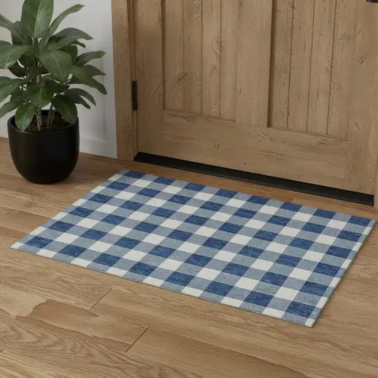 Navy Blue And Ivory Plaid Washable Area Rug With UV Protection Photo 1