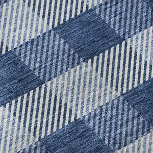 Photo of Navy Blue And Ivory Plaid Washable Area Rug With UV Protection