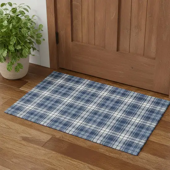 Navy Blue And Ivory Plaid Washable Area Rug With UV Protection Photo 1