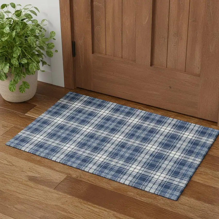 Navy Blue And Ivory Plaid Washable Area Rug With UV Protection Photo 1
