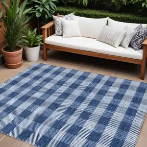 Photo of Navy Blue And Ivory Plaid Washable Indoor Outdoor Area Rug