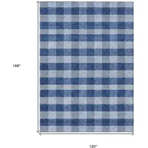 Photo of Navy Blue And Ivory Plaid Washable Indoor Outdoor Area Rug