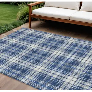 Photo of Navy Blue And Ivory Plaid Washable Indoor Outdoor Area Rug