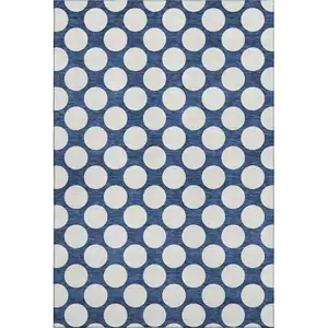 Photo of Navy Blue And Ivory Polka Dot Washable Area Rug With UV Protection