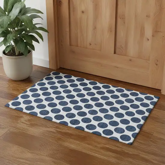 Navy Blue And Ivory Polka Dot Washable Area Rug With UV Protection Photo 1