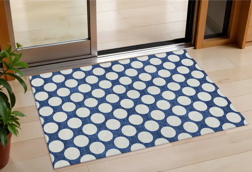 Navy Blue And Ivory Polka Dot Washable Indoor Outdoor Area Rug Photo 1