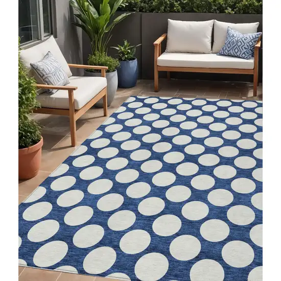 Navy Blue And Ivory Polka Dot Washable Indoor Outdoor Area Rug Photo 1