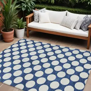 Photo of Navy Blue And Ivory Polka Dot Washable Indoor Outdoor Area Rug