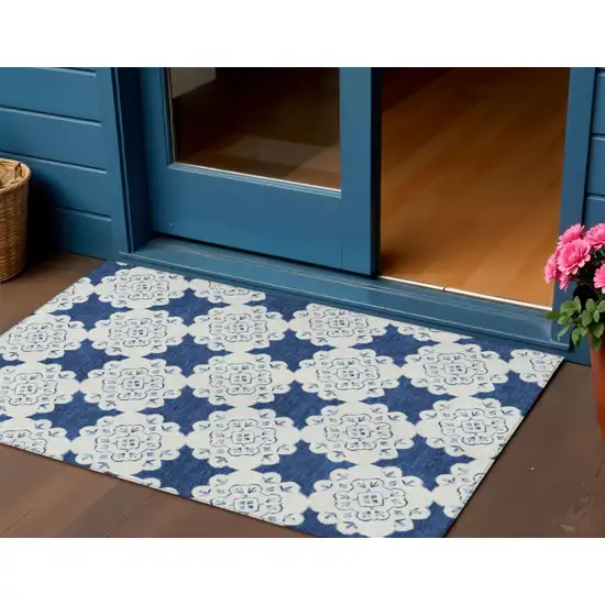 Navy Blue And Ivory Quatrefoil Washable Indoor Outdoor Area Rug Photo 1