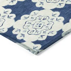 Photo of Navy Blue And Ivory Quatrefoil Washable Indoor Outdoor Area Rug
