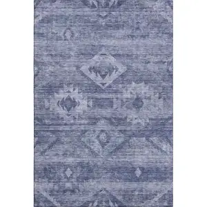 Photo of Navy Blue And Ivory Southwestern Washable Area Rug With UV Protection
