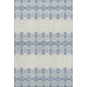 Photo of Navy Blue And Ivory Southwestern Washable Area Rug With UV Protection