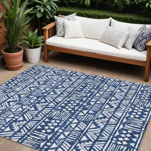 Photo of Navy Blue And Ivory Southwestern Washable Indoor Outdoor Area Rug