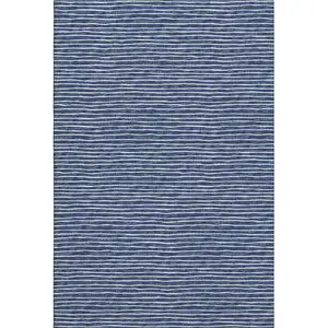 Photo of Navy Blue And Ivory Striped Washable Area Rug With UV Protection