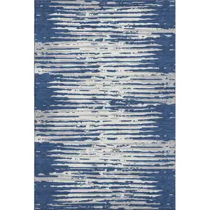 Photo of Navy Blue And Ivory Striped Washable Area Rug With UV Protection